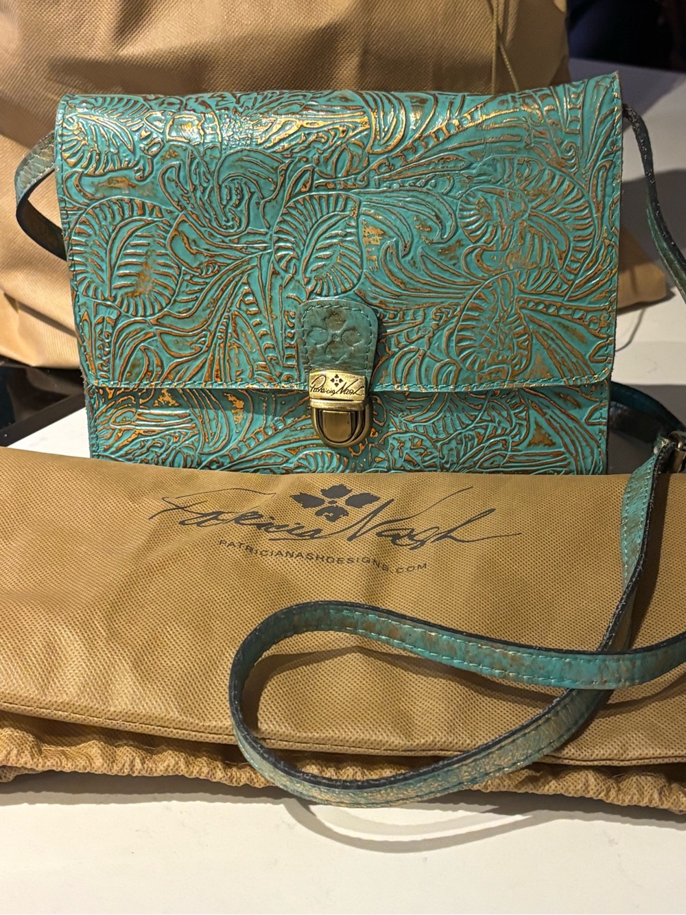 Patricia Nash Turquoise Floral Embossed Leather Crossbody with Gold Accents